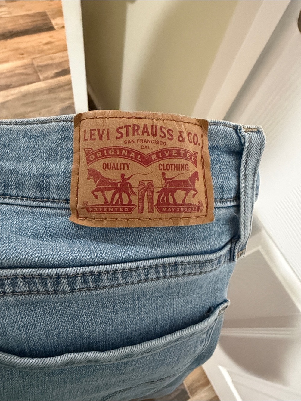 Levi's Light Blue Denim Jeans with Tan Leather Patch